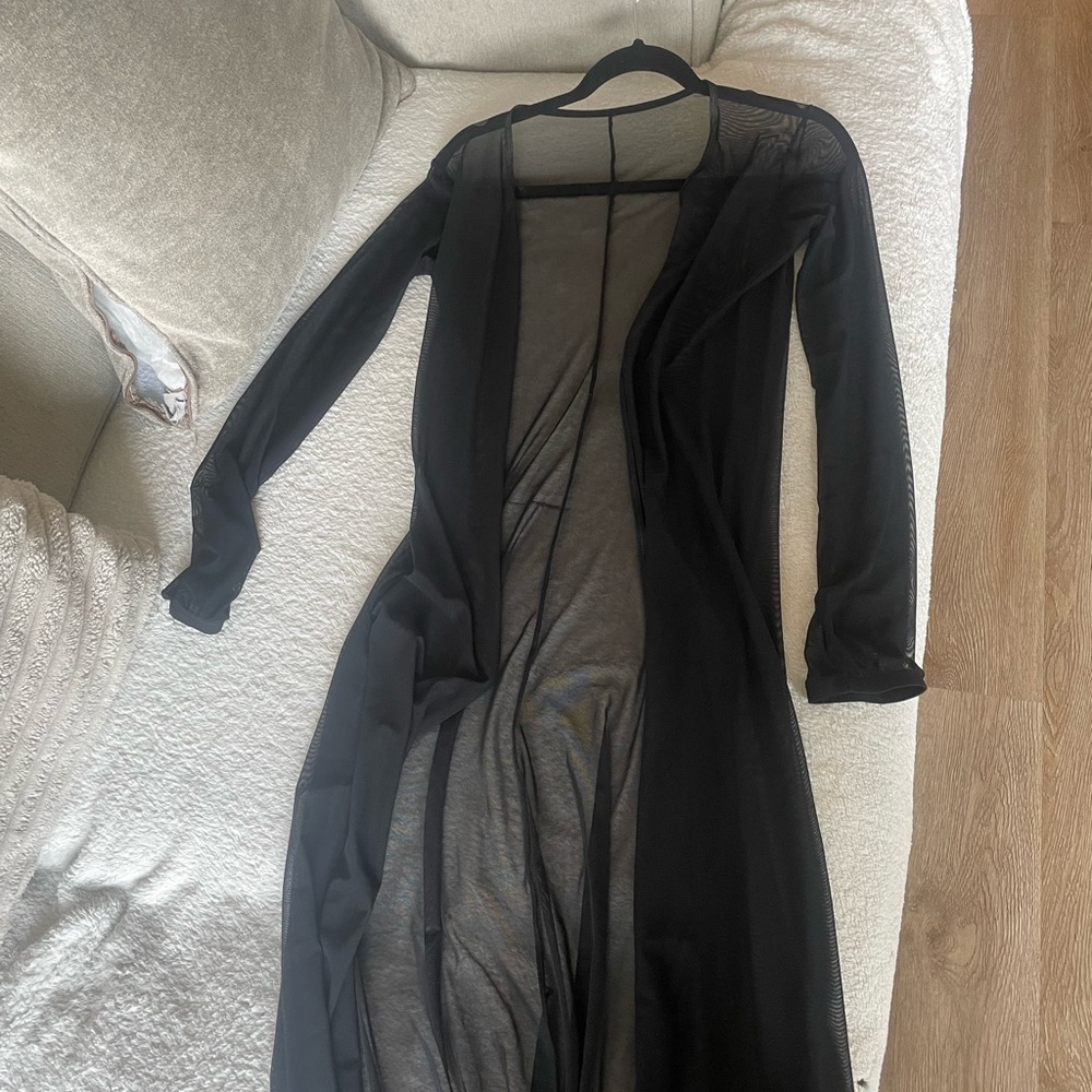 Black sheer pool cover-up.